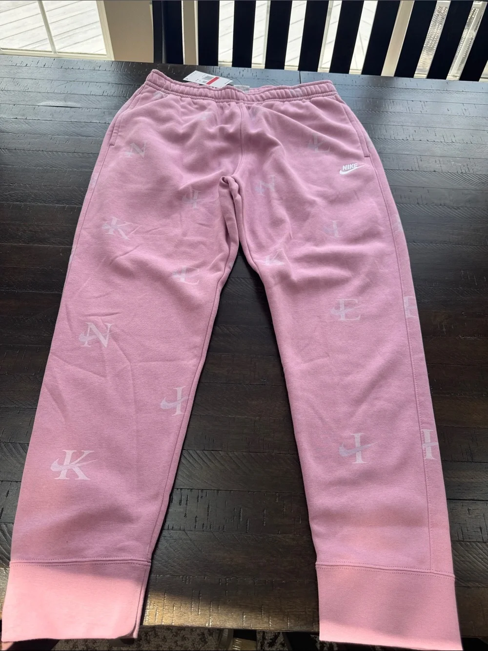 NWT Nike Men’s Pink Tapered Joggers with Subtle Logo